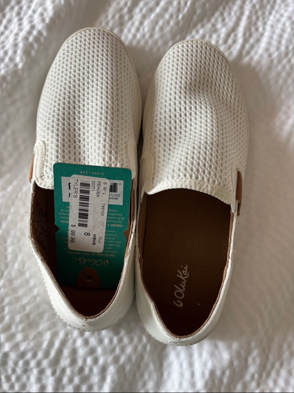 OluKai Women’s Slip-On Flats in White with Brown Insole